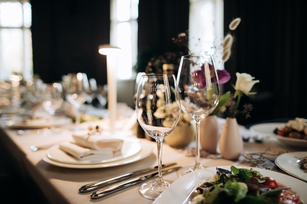 Elegant table set  for a romantic dinner. Catering, hospitality and private dining